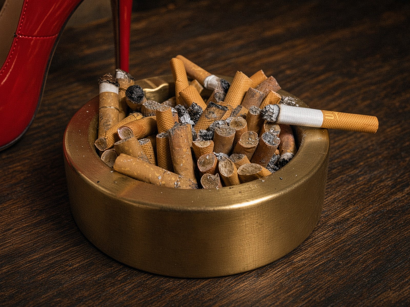 Ashtray and red heel